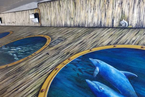 "Tails from the Harbor" by Skip Dyrda and is the 30th mural in the Punta Gorda Historic Mural Society collection and will be dedicated June 20, 2019.