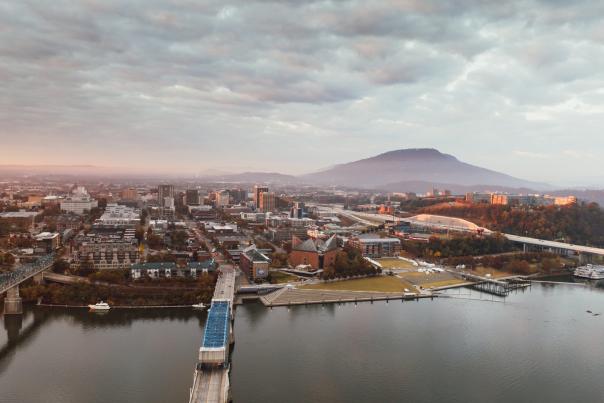 Aerial of river, downtown Chattanooga , and mountain at sunrise