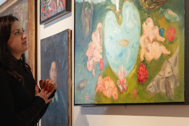 A person admiring artwork at The Wilson Museum. Photography Emlyn Bainbridge
