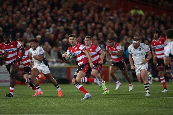 Gloucester Rugby team playing rugby