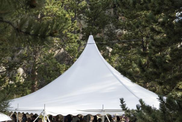 Hynds Lodge outdoor tent wedding at Curt Gowdy State Park, a fun and alternative wedding venue in Wyoming's scenic forest.