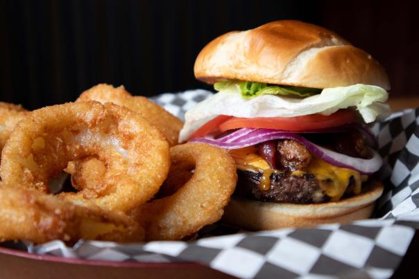 Tree Guys Pizza in Itasca, IL featuring a burger and onion rings