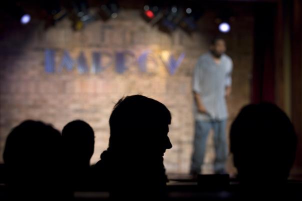 Comedian Performs at Improv Chicago