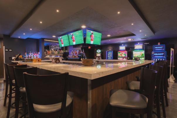 Bar Area With Big Screen Televisions