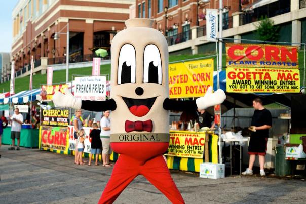 Image is of the Gliers Goettafest Mascot who is dressed like a geotta tube.