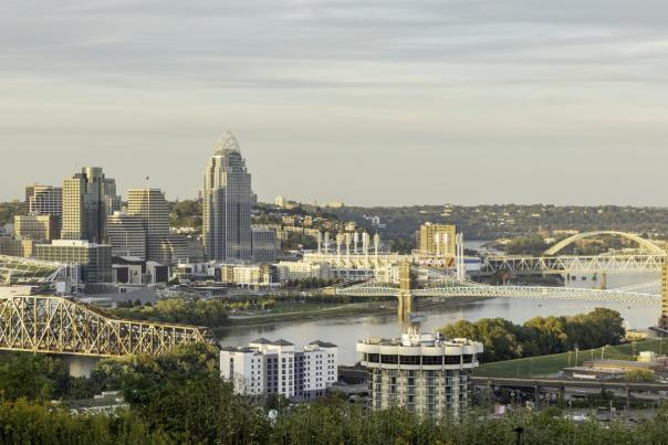 Image is of the view of Covington and Downtown Cincinnati with the bridges connecting them.