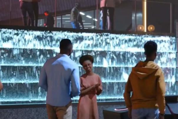 A rendering of people standing in front of a waterfall near the Cincinnati Black Music Walk of Fame