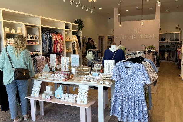 woman shops at a boutique