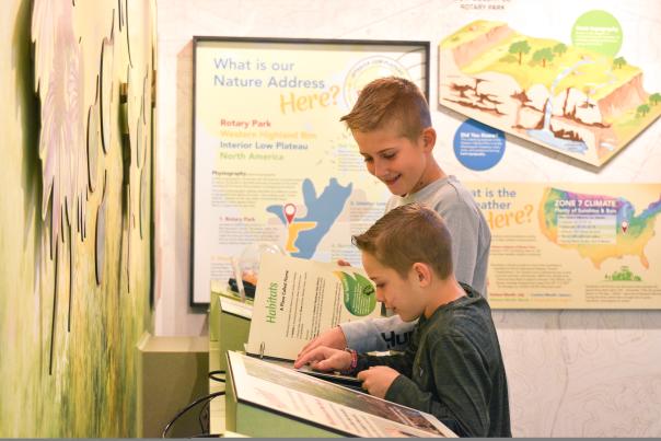 children read at exhibit