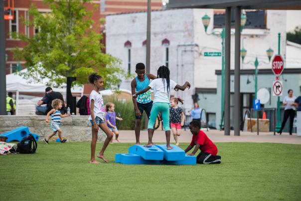 children playing with blocks at Downtown Commons