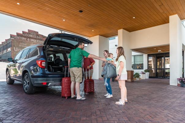 Family checking in at DoubleTree hotel in Clarksville, TN.