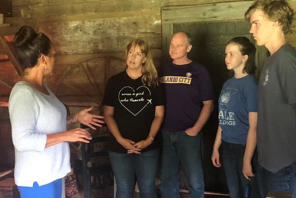 family touring historic site