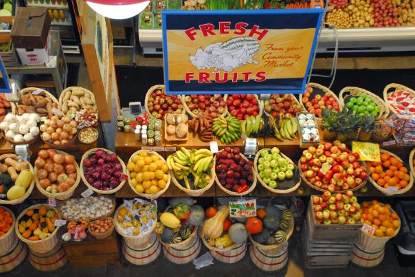 Shot from above of colorful fresh produce baskets at North Market