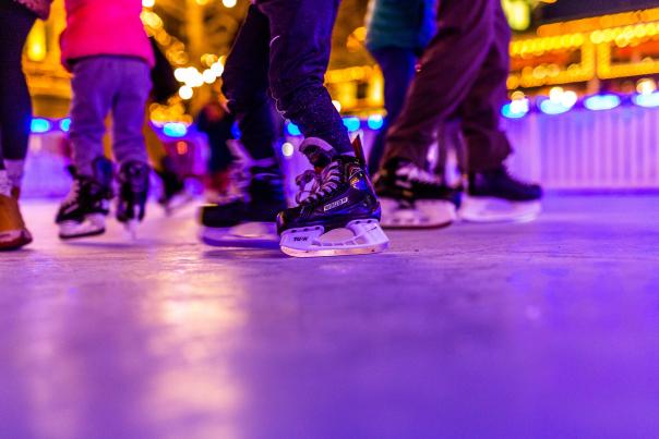 Close up image of ice skates at night on Easton Town Center's skating rink