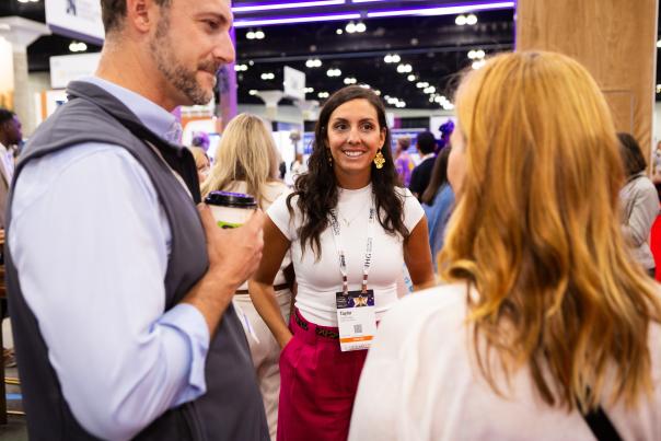 Three people converse at Experience Columbus Client Event at Los Angeles Convention Center during ASAE's 2025 Annual Meeting.
