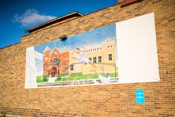 Mural in King-Lincoln Bronzeville depicting scenes from the neighborhood
