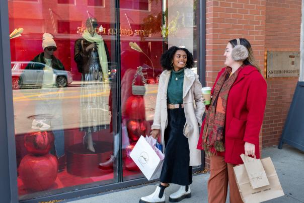 Two women shopping during winter