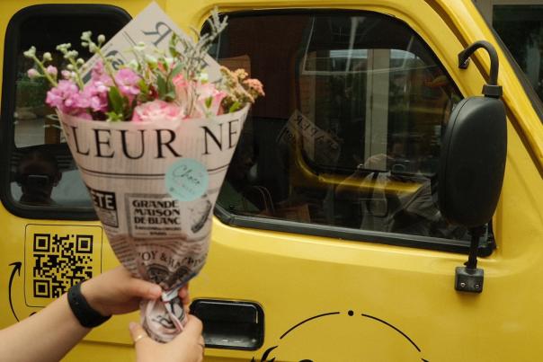 A flower vendor at the Dublin Market