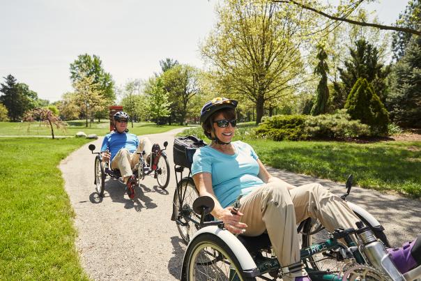 Rosemarie Rossetti and Mark Leder bike outdoors in Columbus