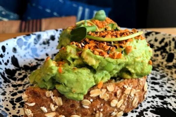 Close-up of avocado toast on patterned plate from Little Eater