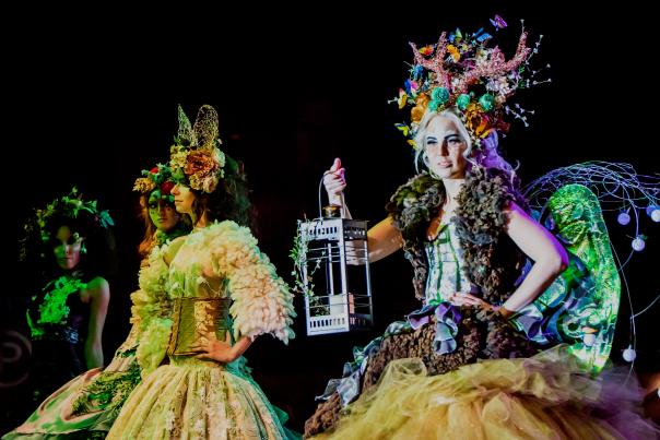 Women wearing extravagant Halloween costumes