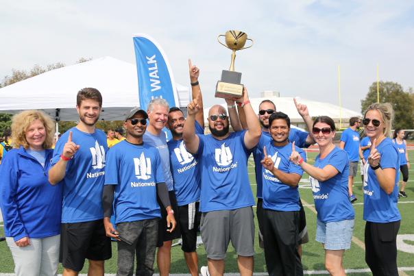 2019 Community Cup - Team Nationwide holding trophy