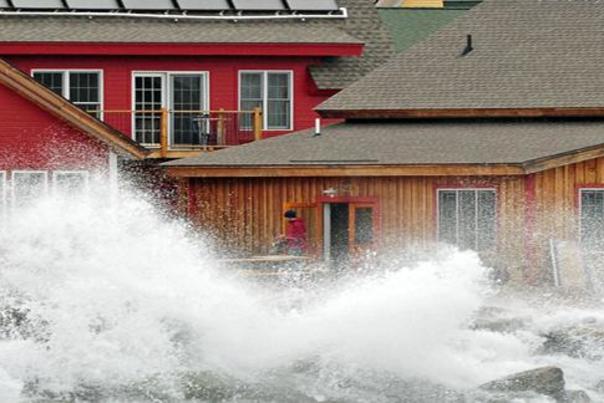 Waves knocking on North House Folk School door (Cathy Gray-Anderson photo)