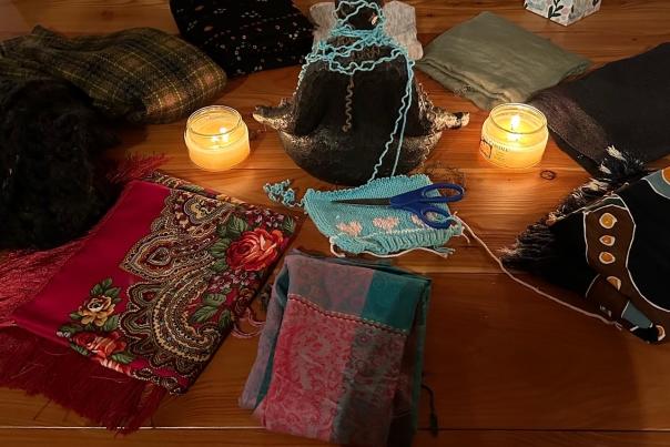 various shawls and candles