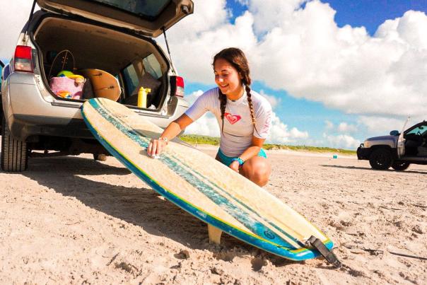 Lyra Girl and Surfboard