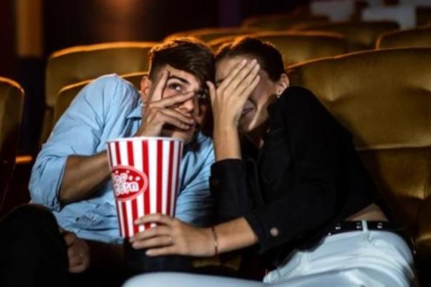 Couple watching scary movie