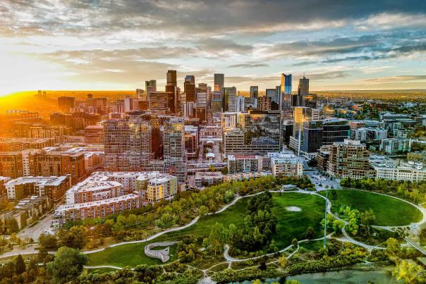 An aerial view of the Denver, Colorado, skyline during sunrise.