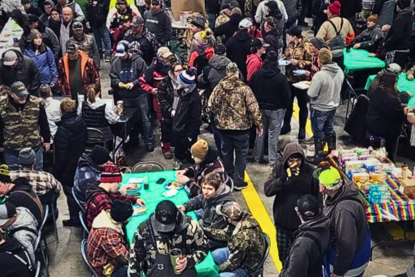 Anglers gather in the Minnewaukan Fire Station to celebrate the FFFishtival ice fishing tournament