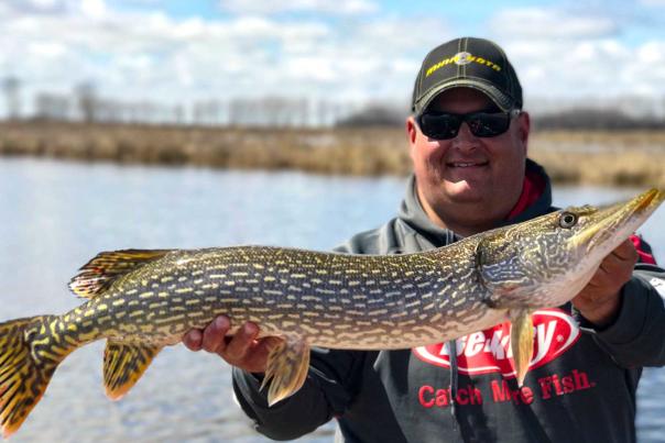 Cody Roswick holds a large Devils Lake, North Dakota pike.