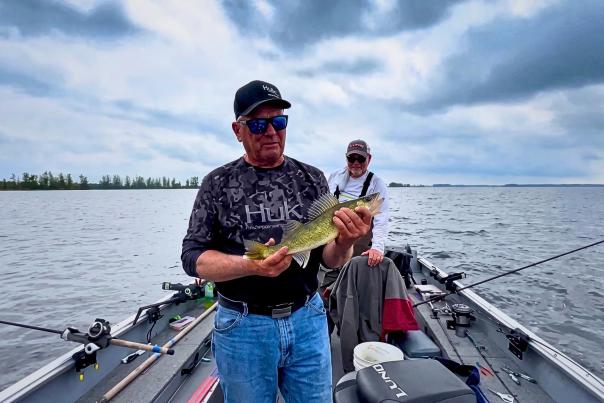 Professional Devils Lake, ND fishing guide, Dave Randash, holds up a walleye.