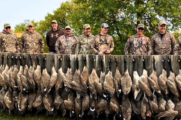 Bird hunters standing with their North Dakota Devils Lake geese