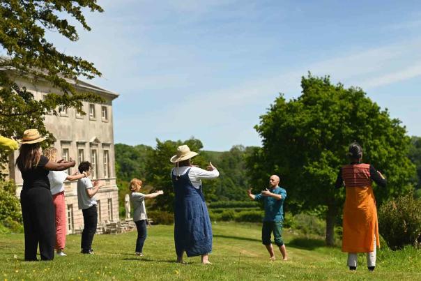 group taking place in the grounds of sharpham trust