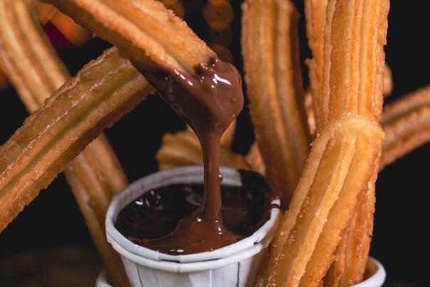 churros dipped in chocolate