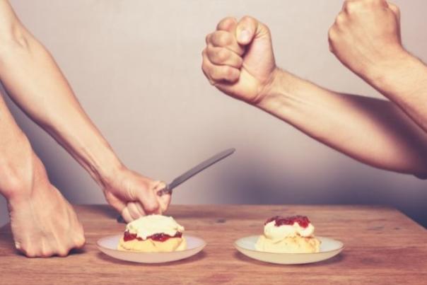 people fighting over which way to do a cream tea
