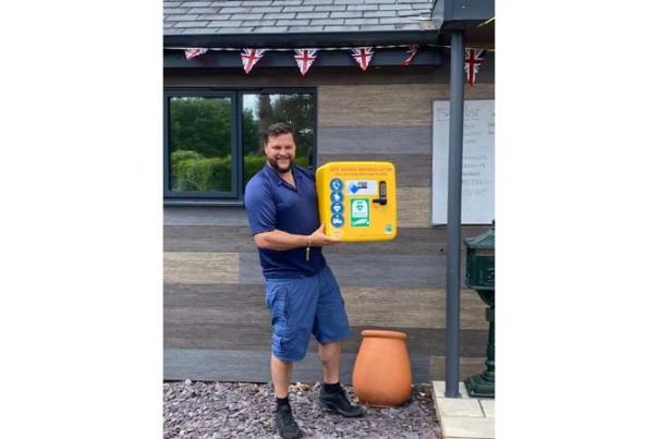 oakdown team member with defibrillator