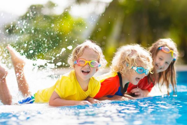 children playing in pool