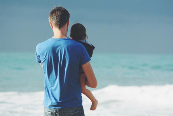 man holding child