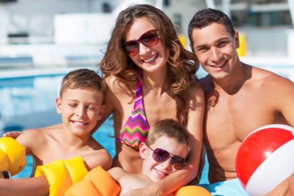 family at swimming pool