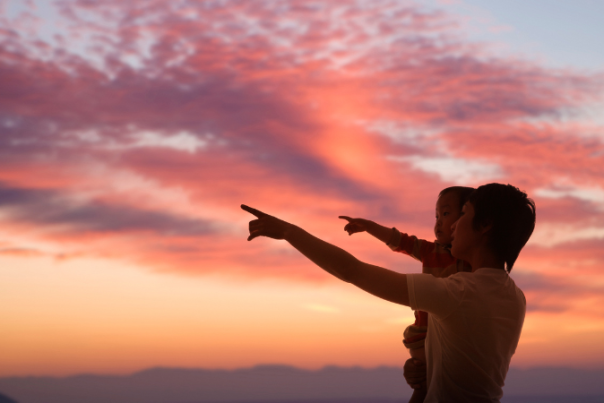 mother and child against sky