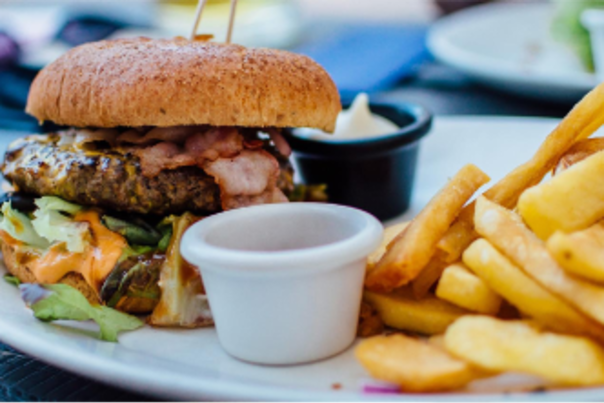 A burger and chips on a plate