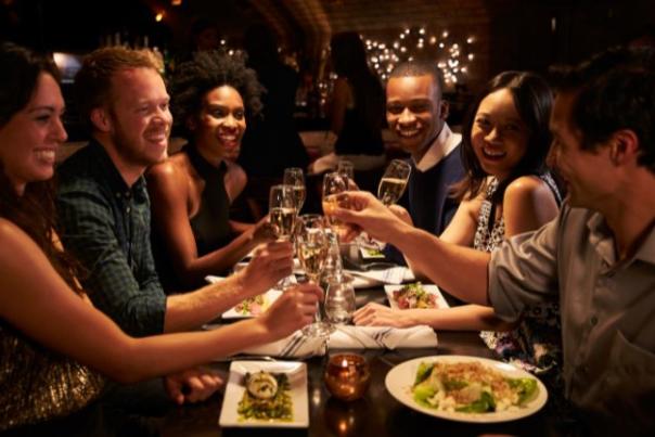group of people eating dinner