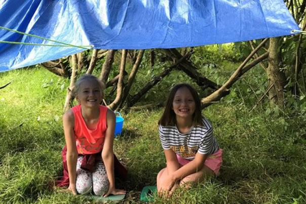 children under tarp