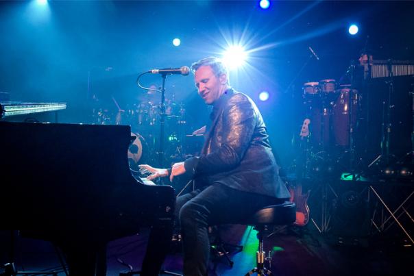 image shows darren playing piano
