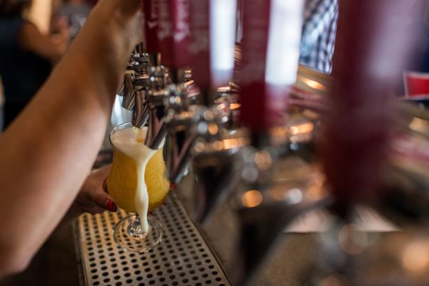 Pouring craft beer from the tap at Weyerbacher Brewing in Easton, PA