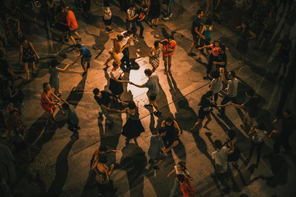 Crowd line dancing via Unsplash