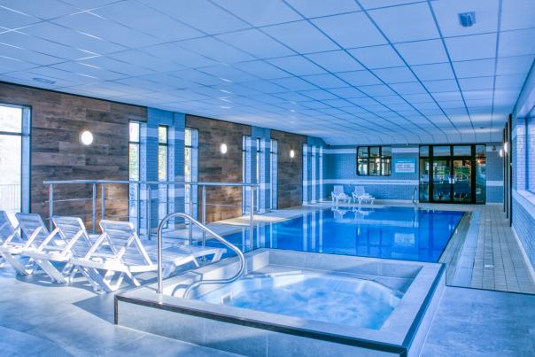 Indoor swimming pool and jacuzzi at Newlands Holiday Park in Dorset
